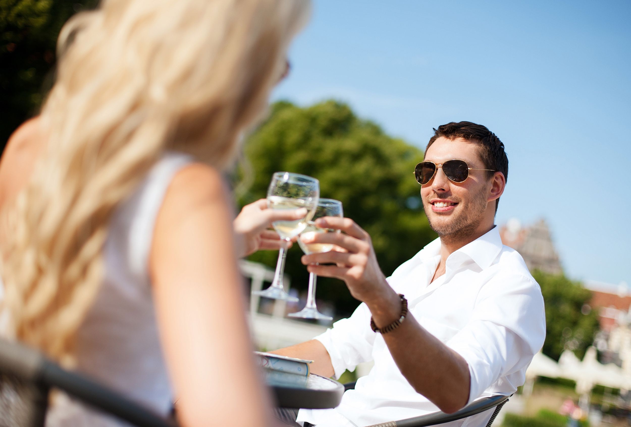 man and woman with wine glasses