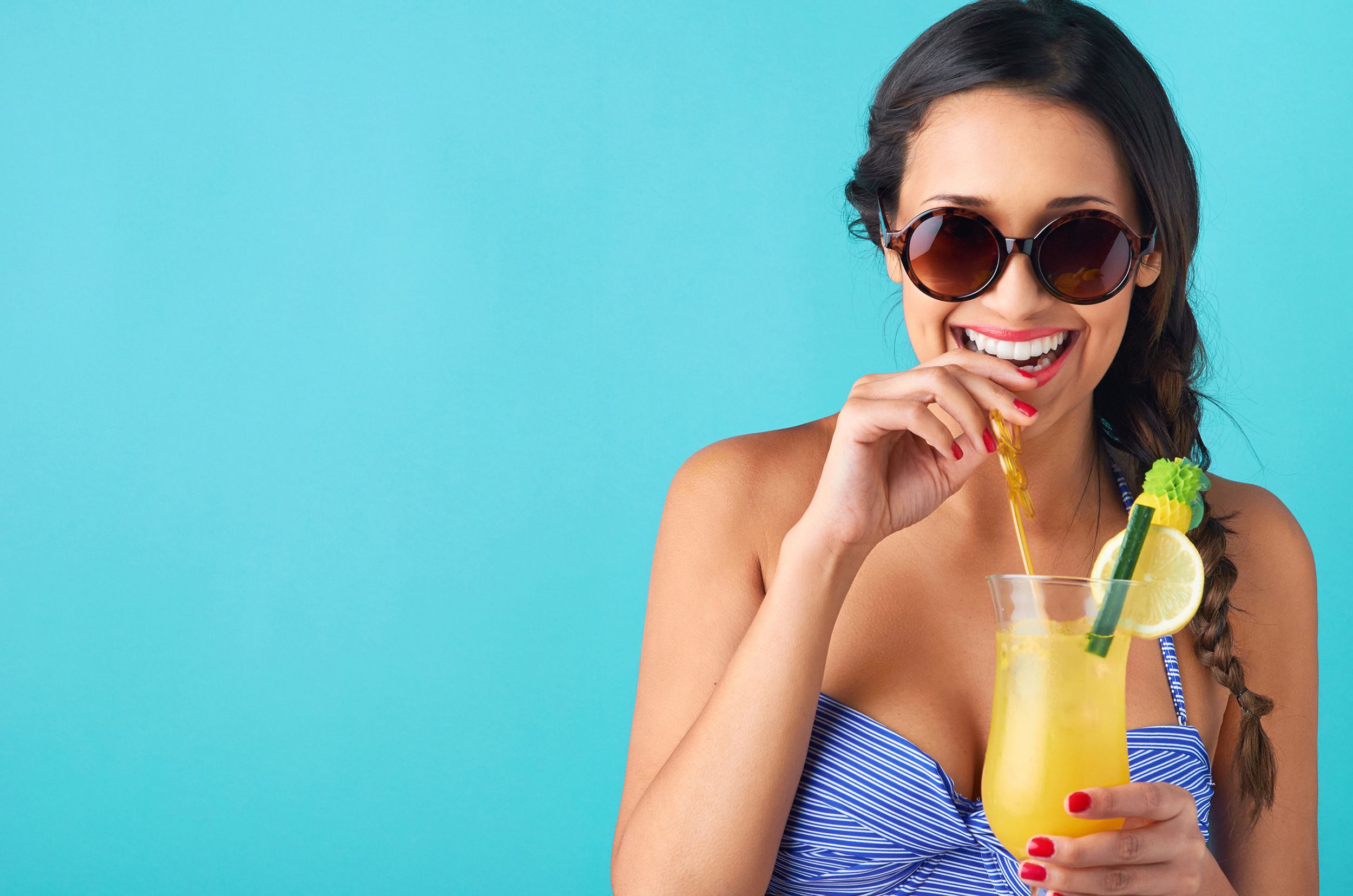 Woman smiling with drink