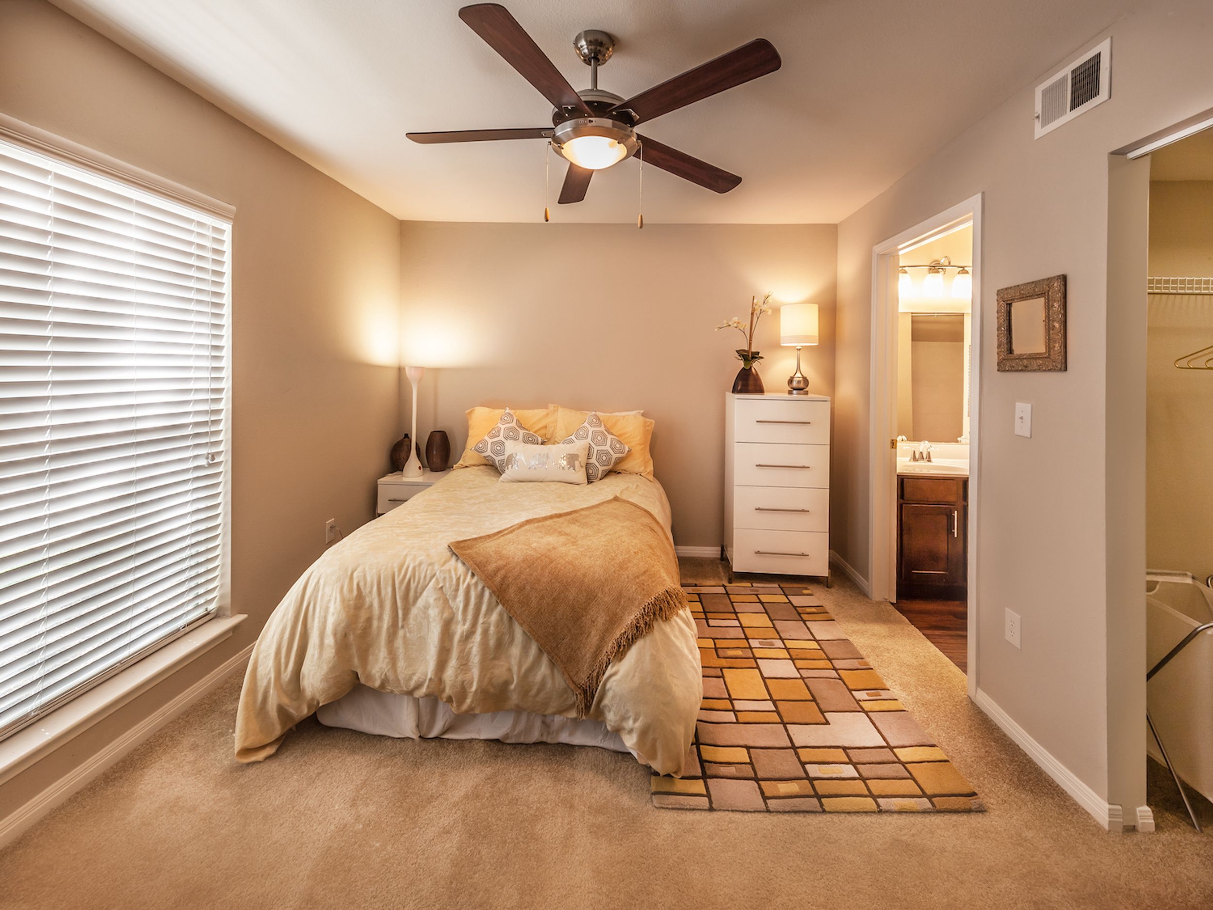 Spacious kitchen with granite counter tops, dark wood cabinetry, and stainless steel appliances