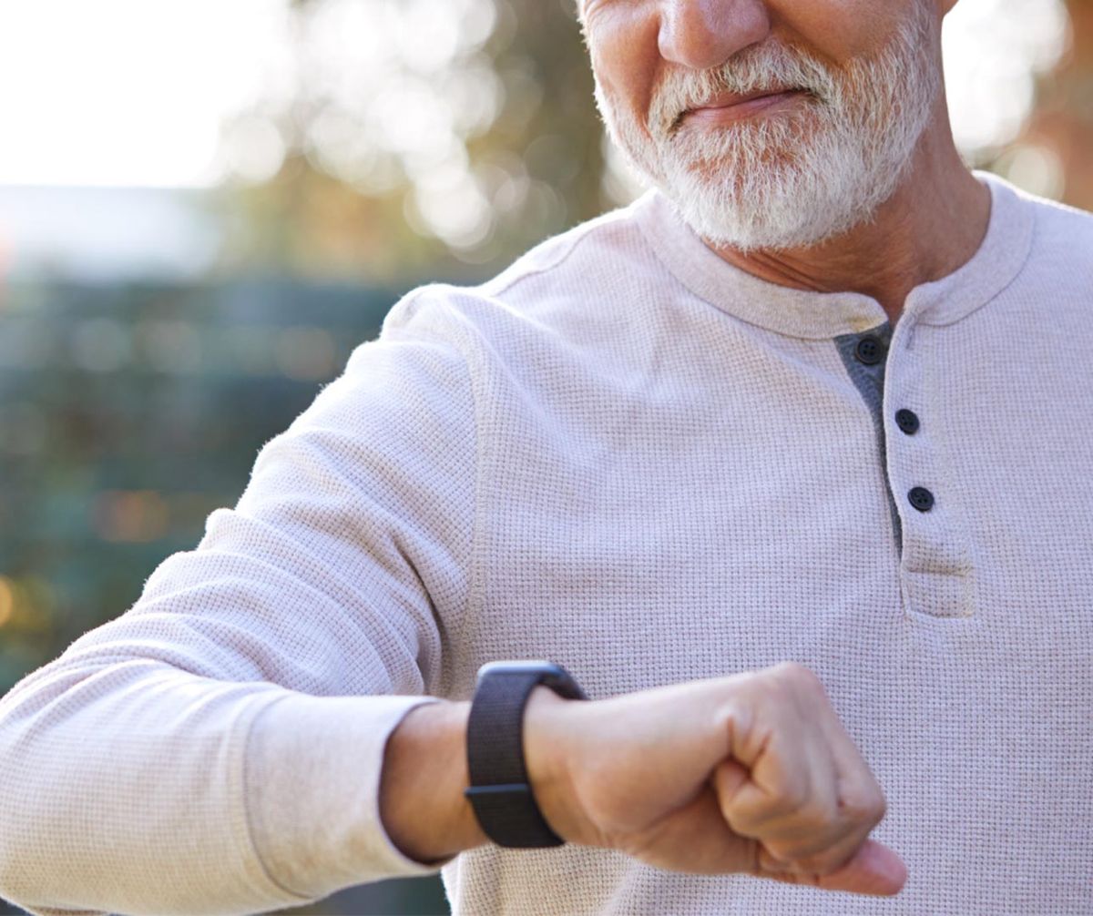 senior checking smart watch