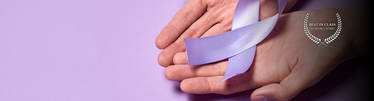 alzheimers disease purple ribbon and hands holding it