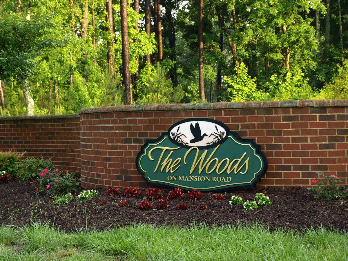 The Woods signage