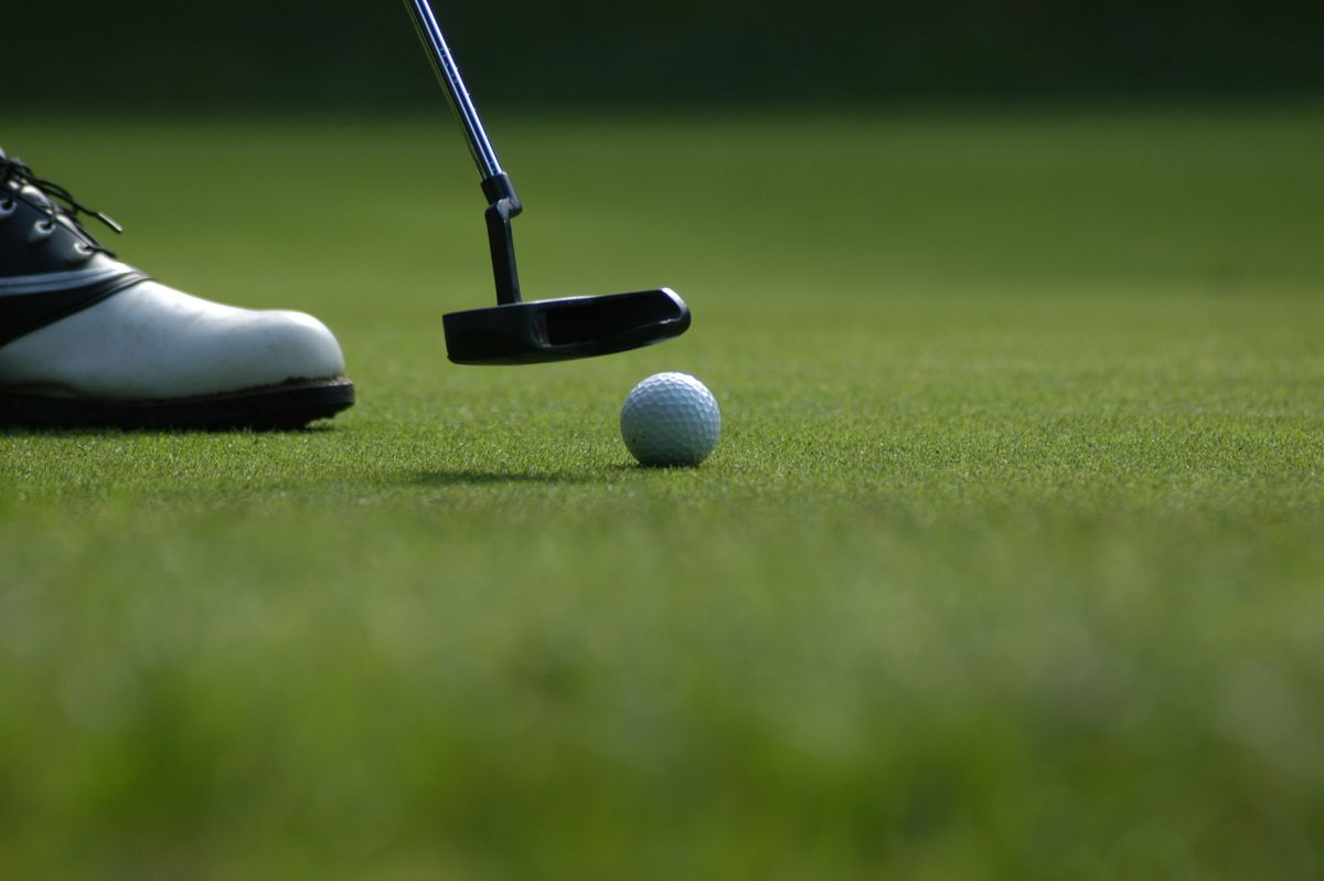 golf putter and ball