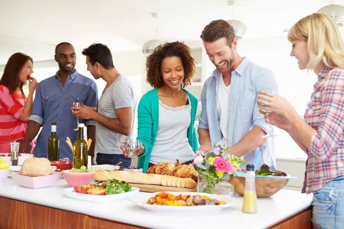 group of people enjoying food and drinks